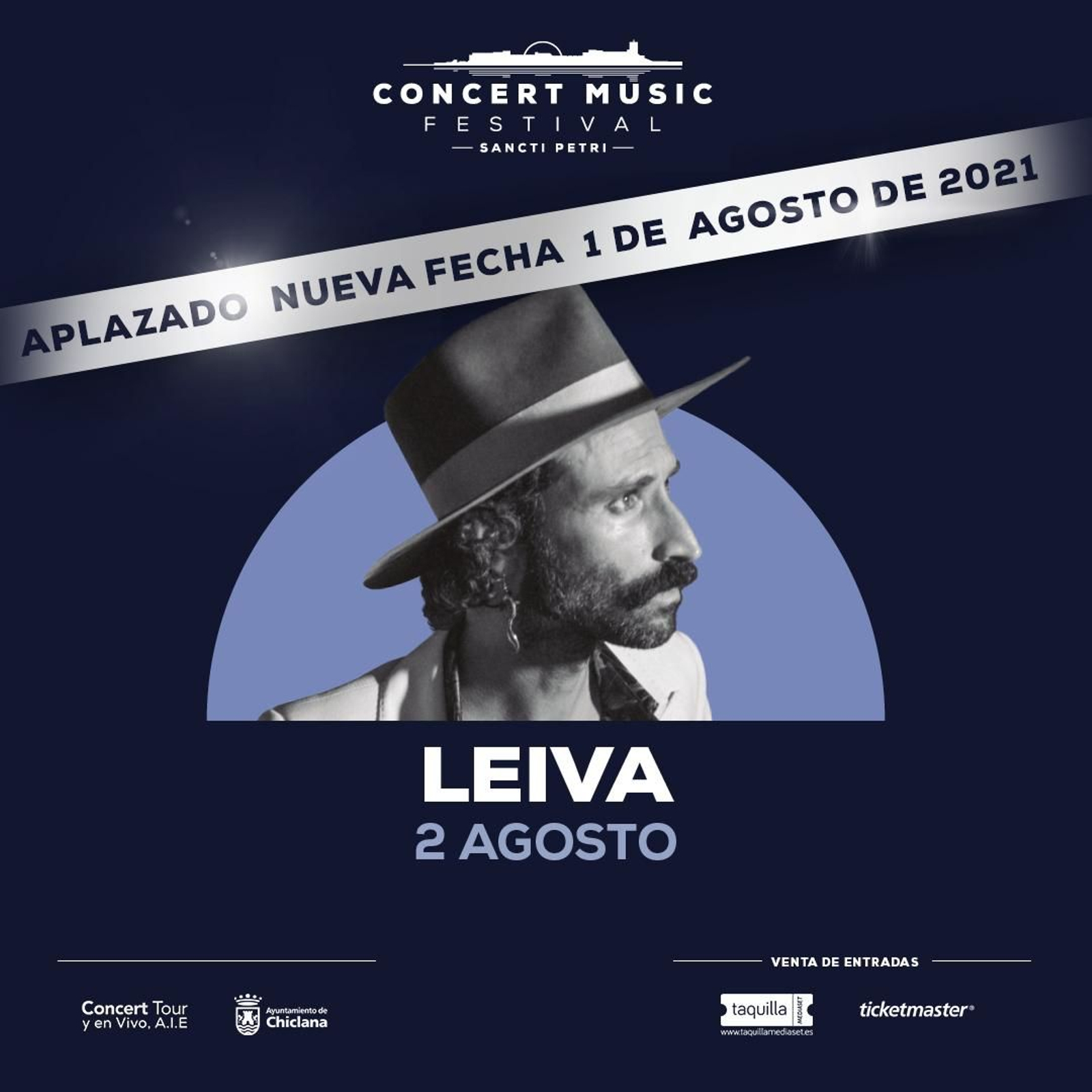 Cartel con la nueva fecha del concierto.