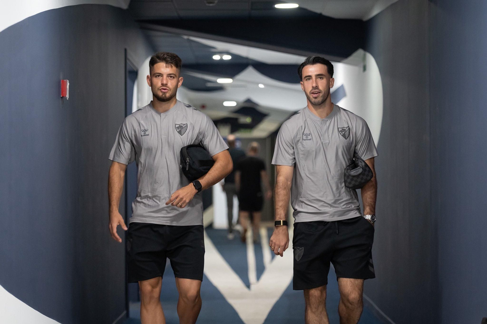 Dani Lorenzo y Carlos Puga en la llegada al estadio