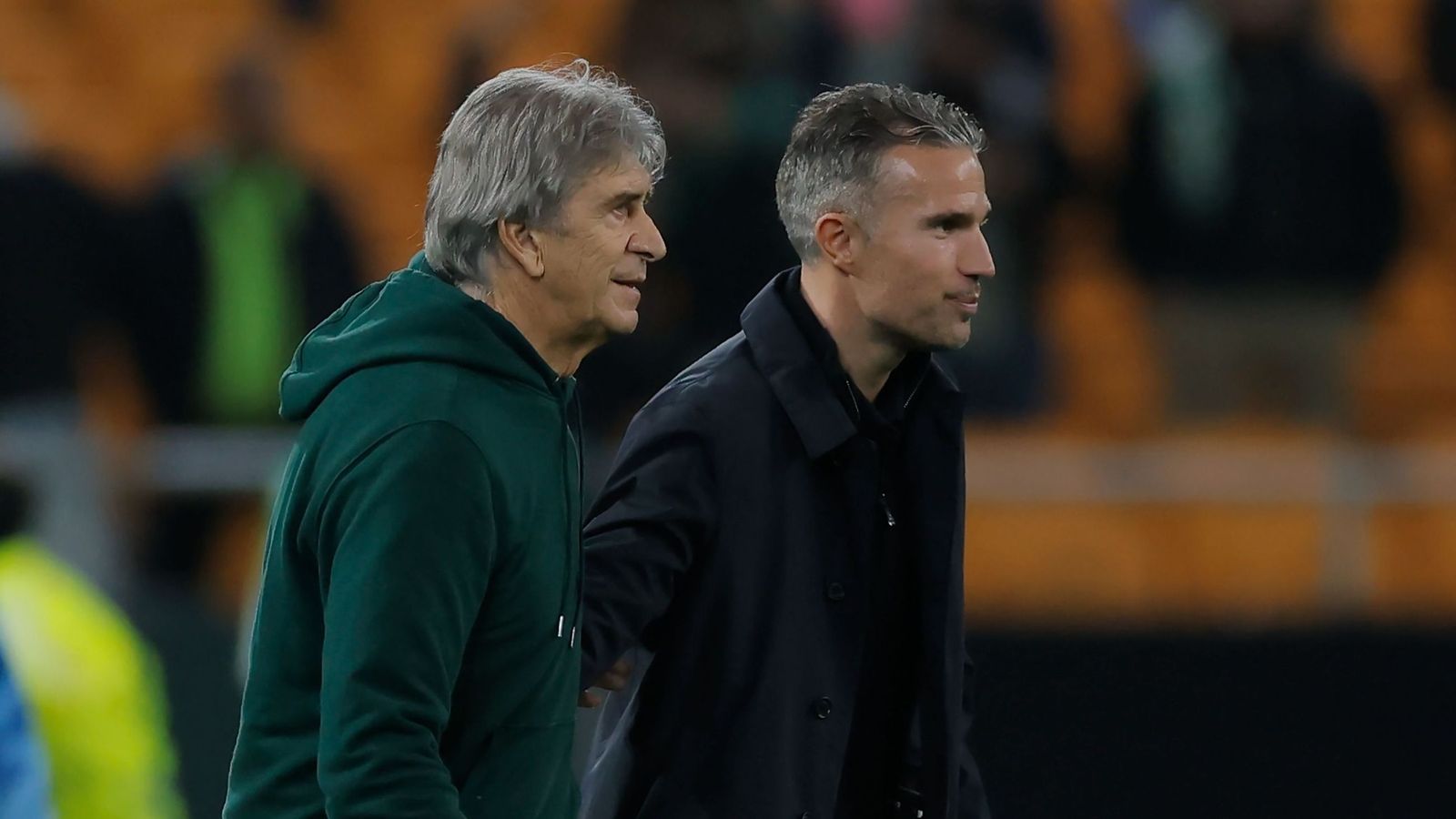 Manuel Pellegrini y Robin Van Persie.