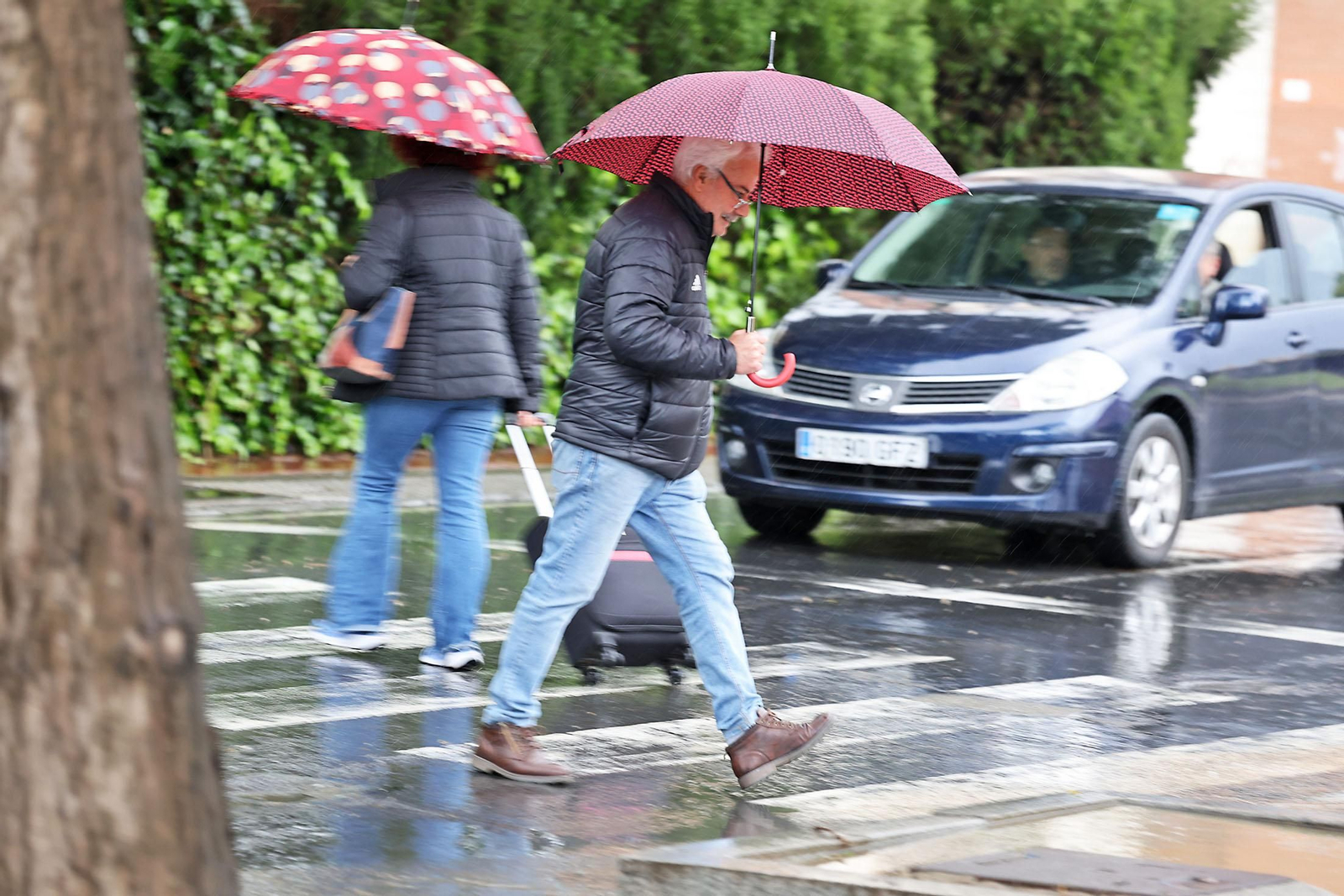 Las imágenes de la lluviosa mañana del jueves 13 de marzo en Huelva