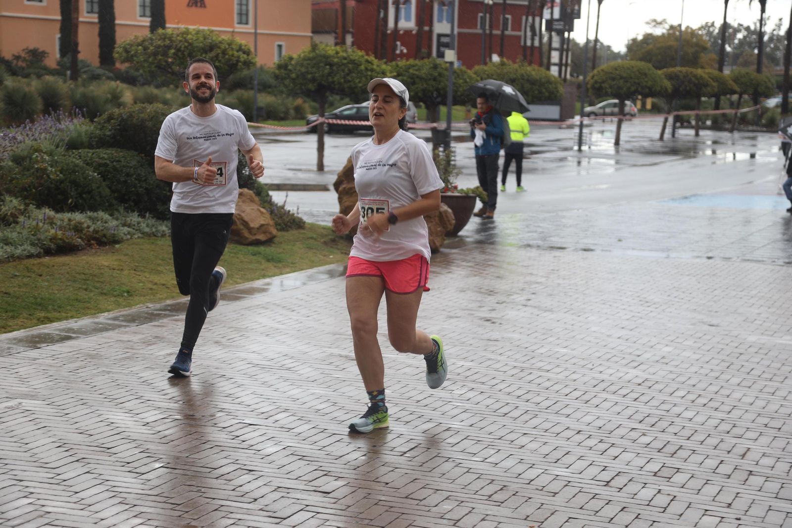La Carrera por el Día Internacional de la Mujer en Málaga, en fotos