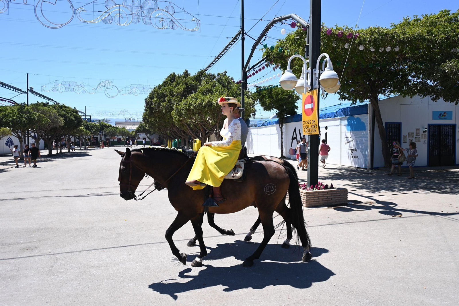 Las fotos del lunes festivo en la Feria en Málaga
