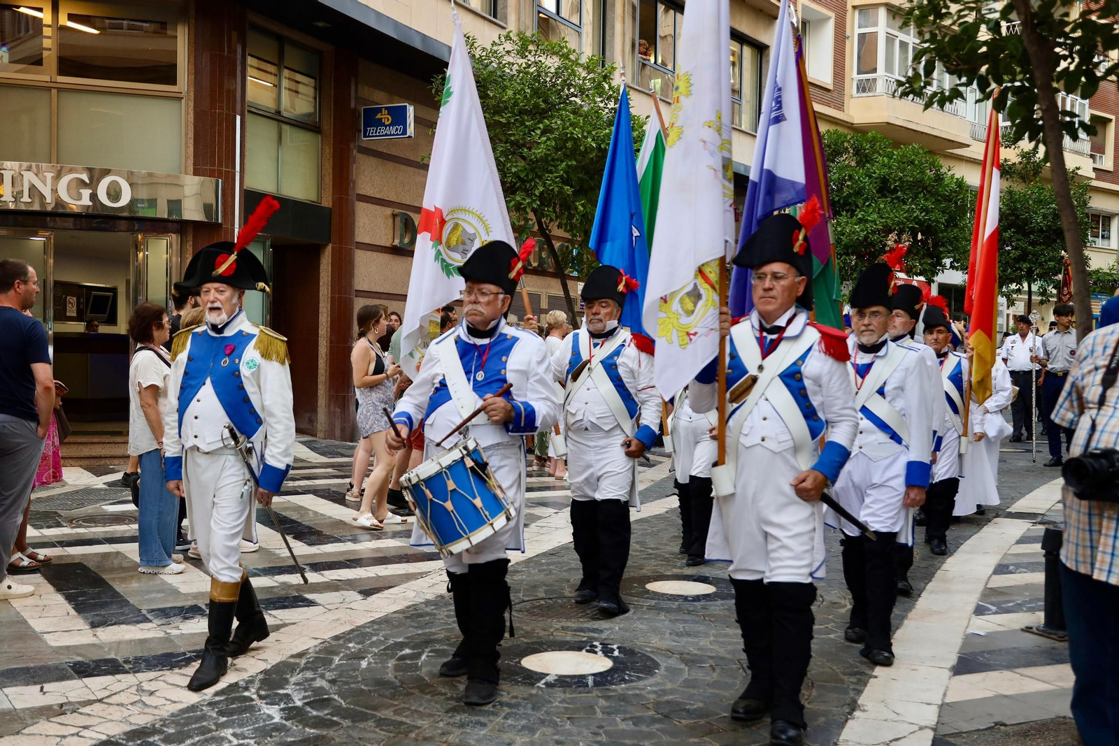 La procesión de los Santos Patronos de Málaga, en fotos