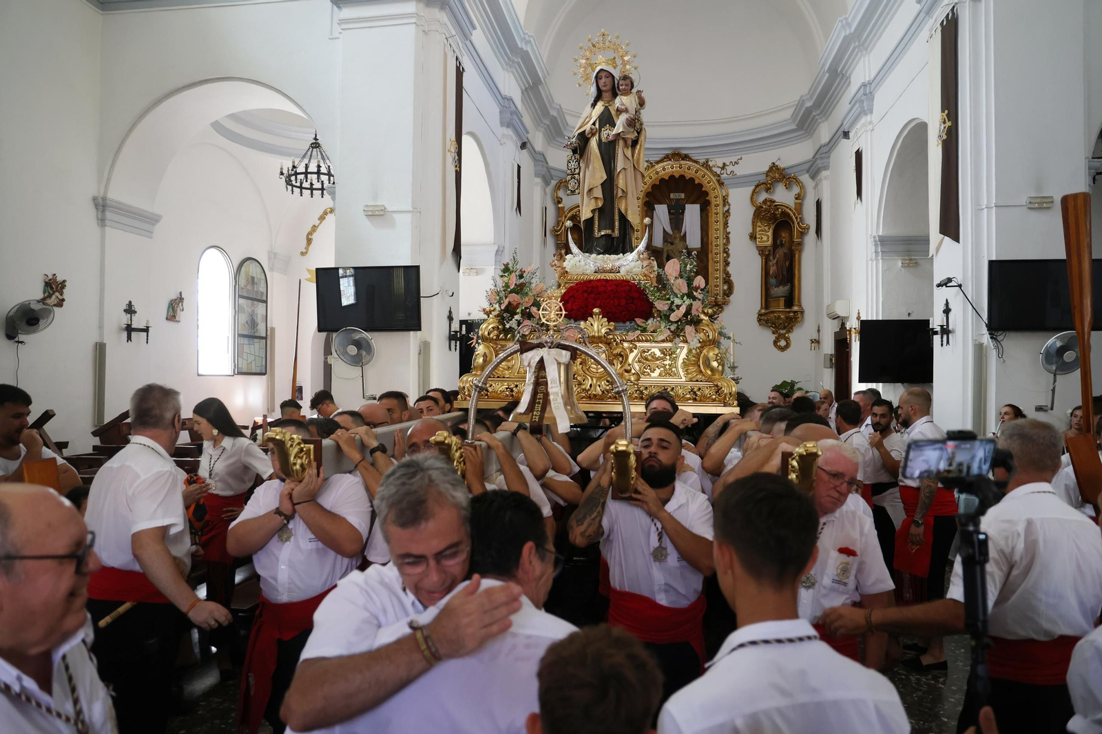 La procesión de la Virgen del Carmen en El Palo, en Málaga, en imágenes