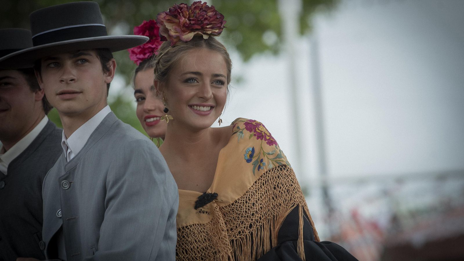 La felicidad reflejada en los rostros de estos jóvenes que disfrutan de la Feria a lomos de un caballo.