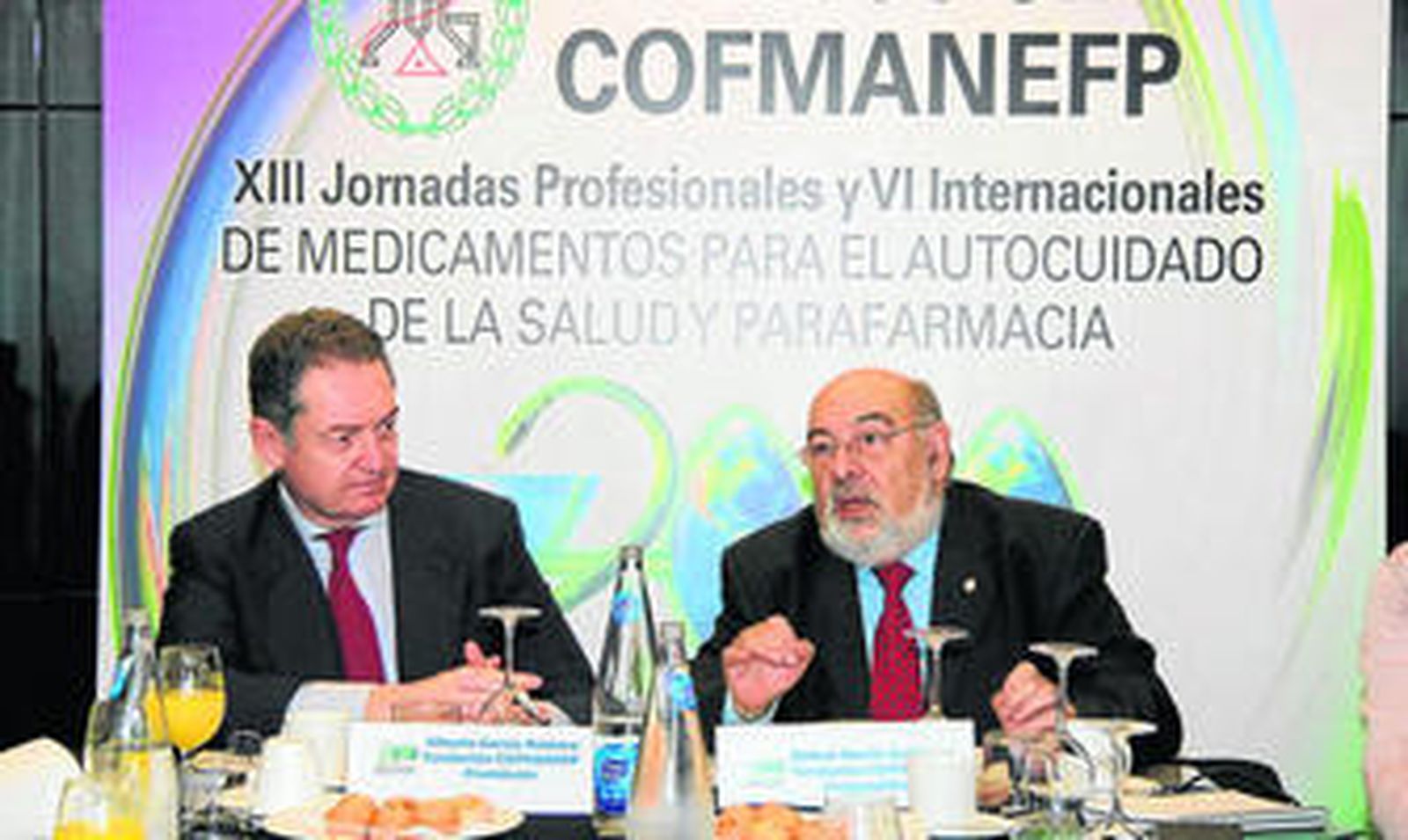 Alberto García Romero, del Colegio Oficial de Farmacéuticos de Madrid, y Rafael García Gutiérrez, de Anefp.
