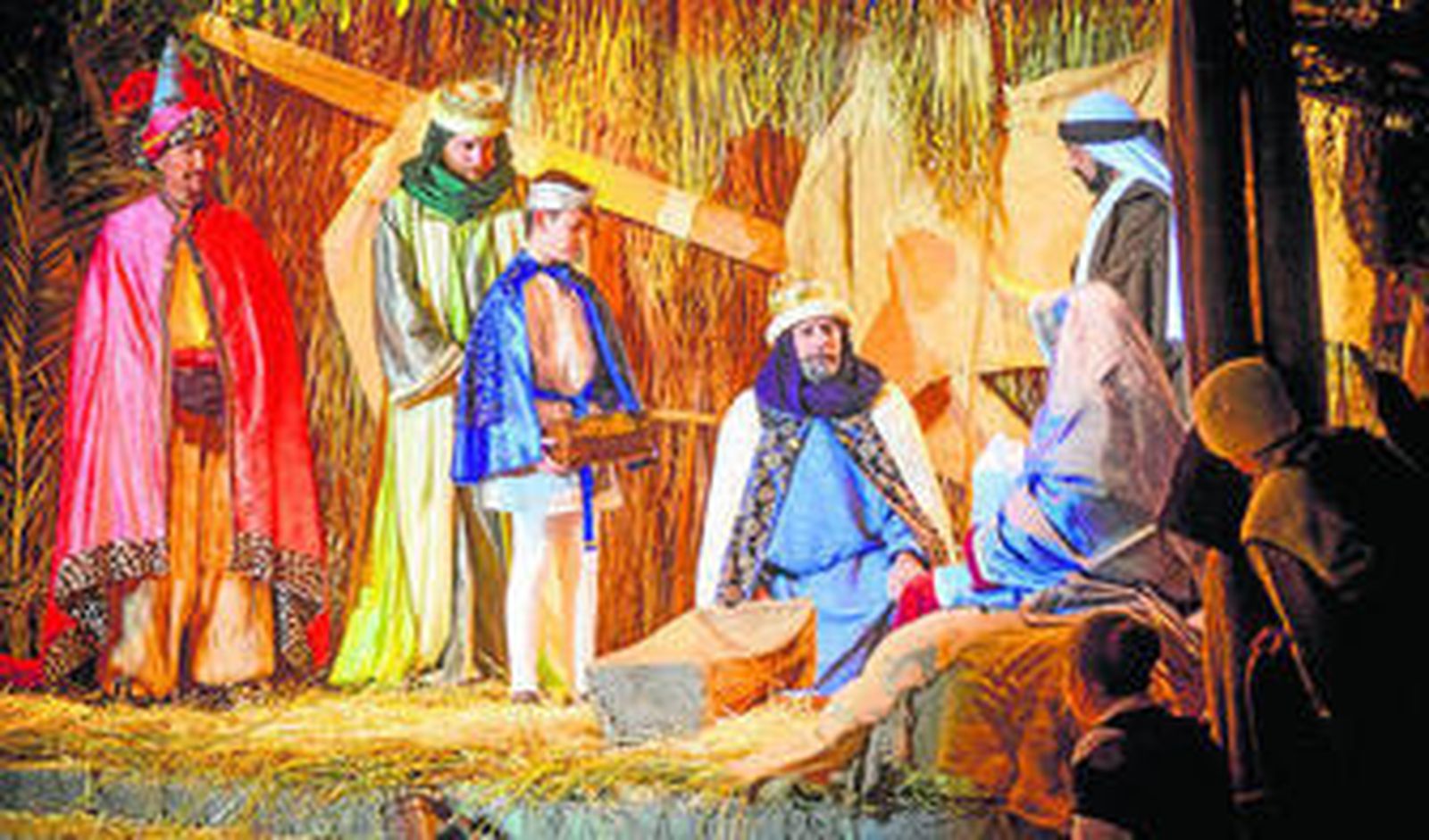 Escena de la llegada de los Reyes Magos al belén.