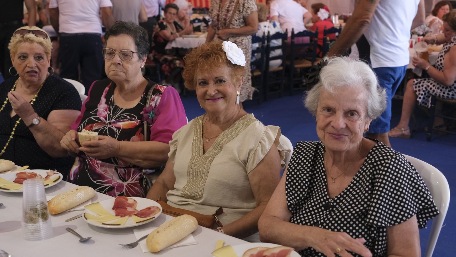 Imágenes de la comida homenaje a los mayores en la Caseta Municipal de la Feria de Almería 2022