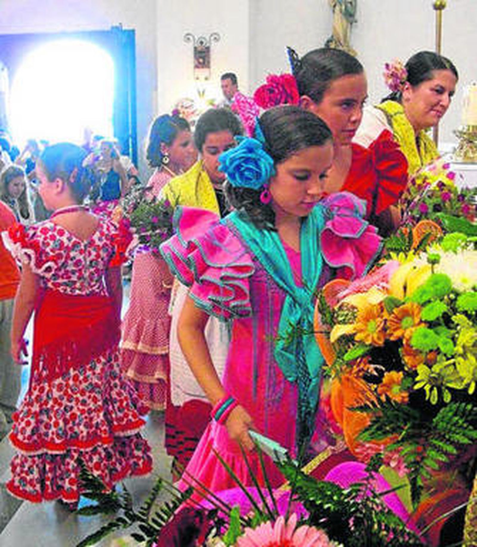 Flamenco, deporte y pétalos de rosas para honrar a San Agustín