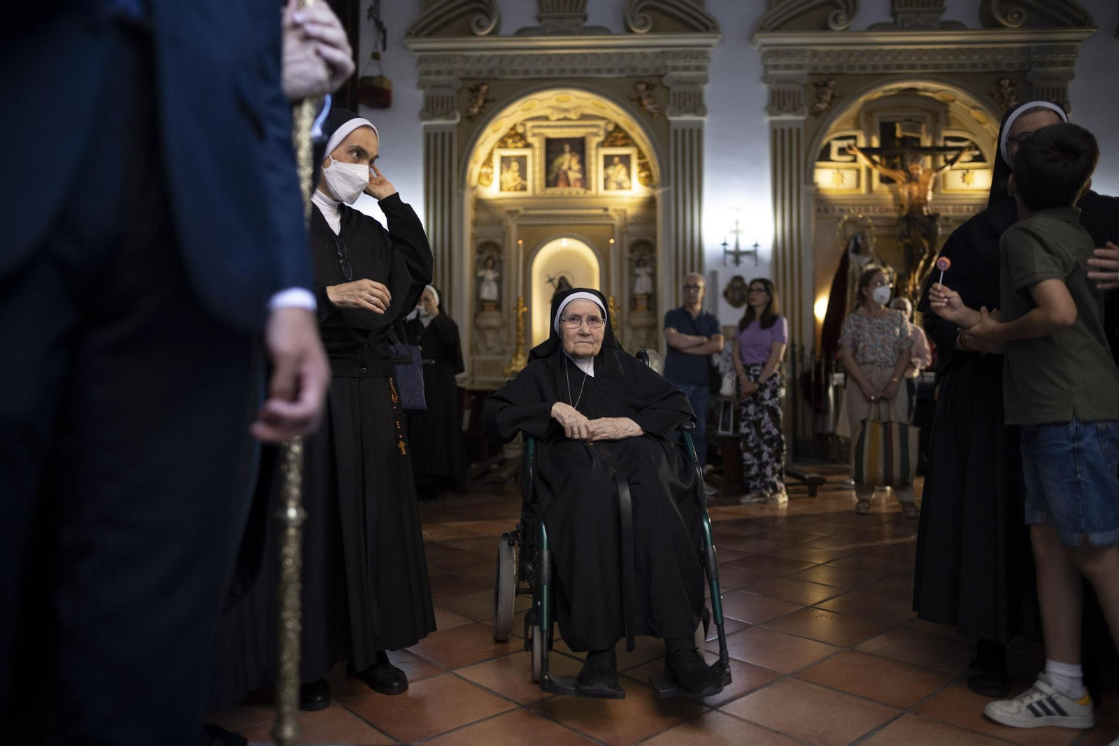 Imágenes de la salida extraordinaria de La Borriquita por las calles de Huelva