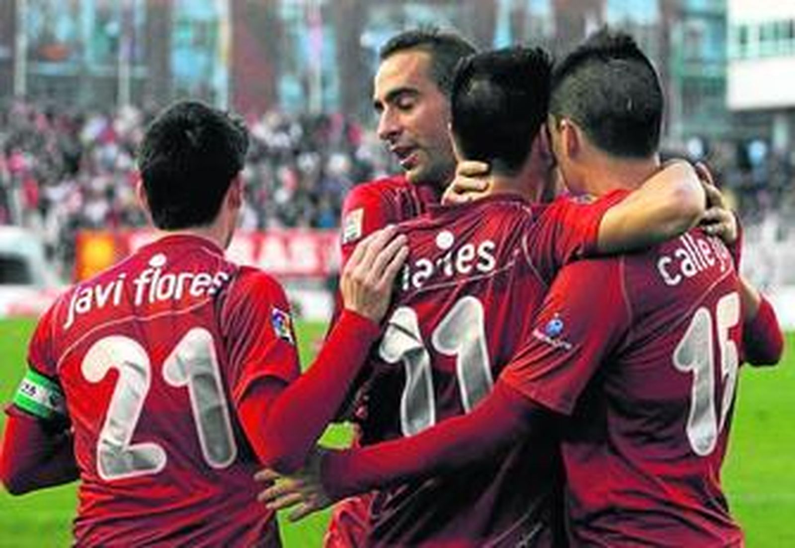 Javi Flores, Alberto Aguilar, Charles y Juanmi Callejón celebran el 1-2 provisional en el Teresa Rivero.