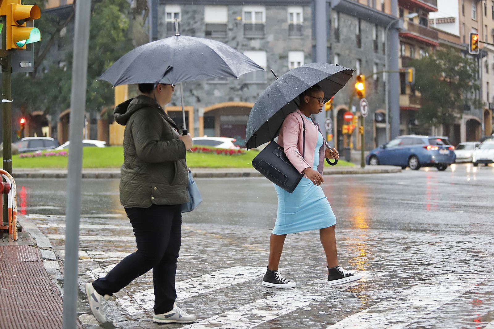 imágenes de la lluviosa mañana en Huelva