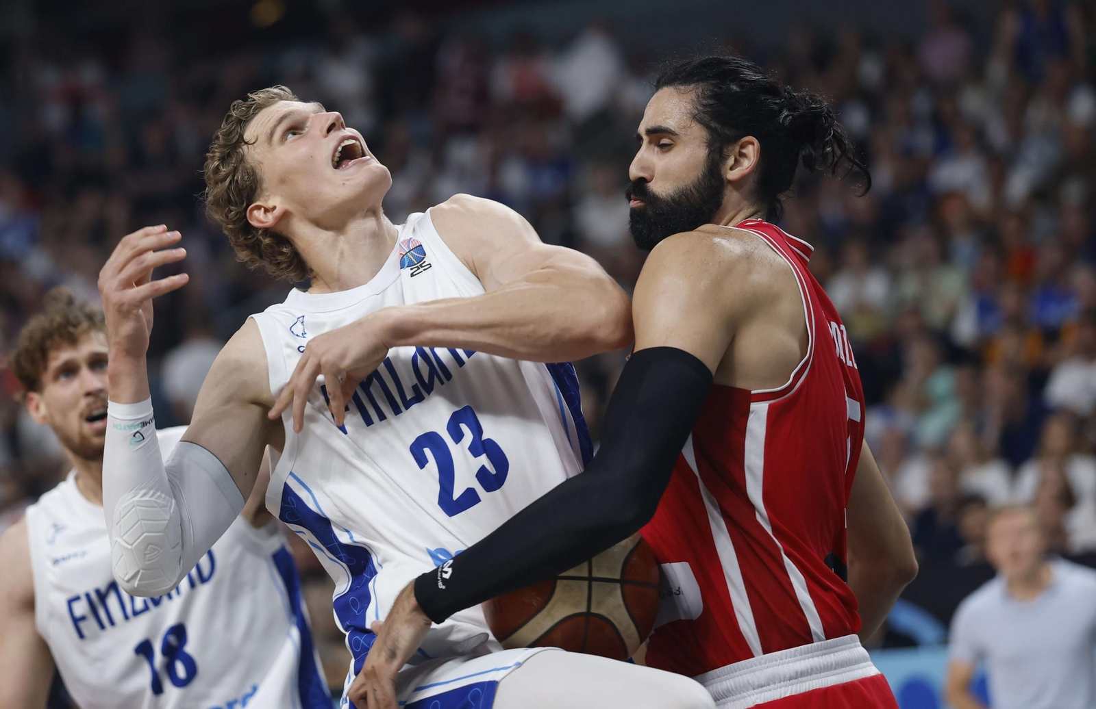 Markkanen y Bitadze.