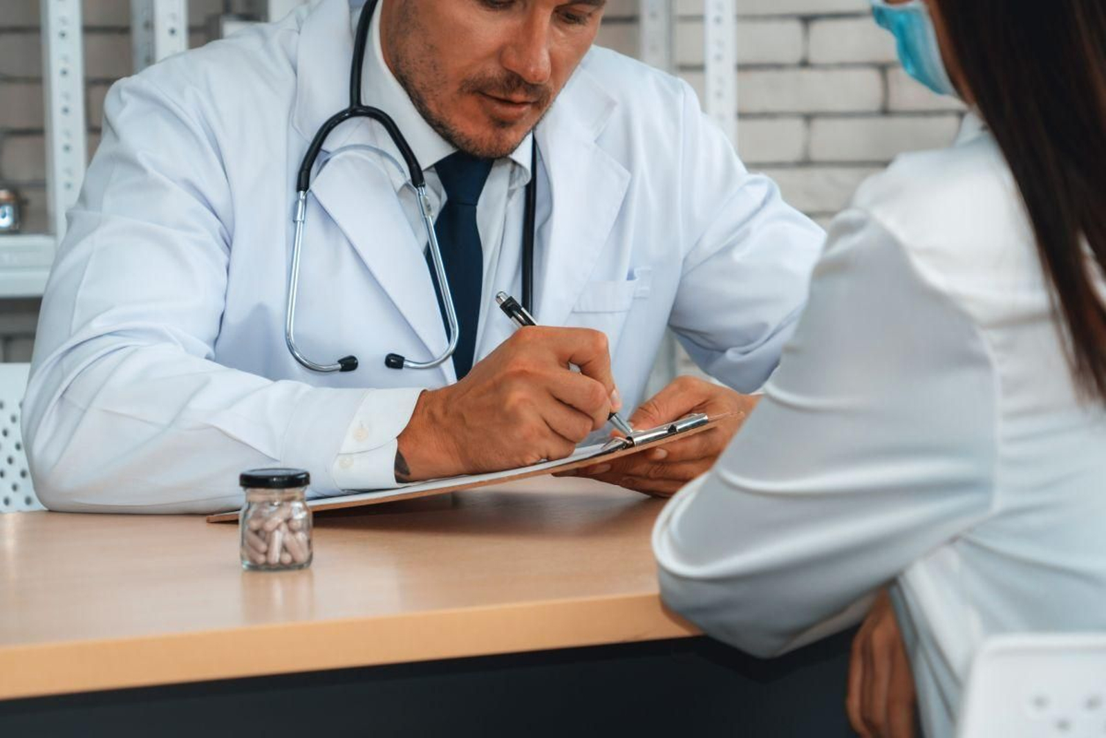 Médico con paciente.