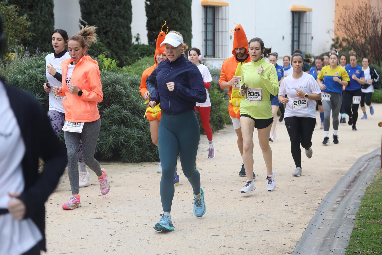 La Carrera por el Día Internacional de la Mujer en Málaga, en fotos