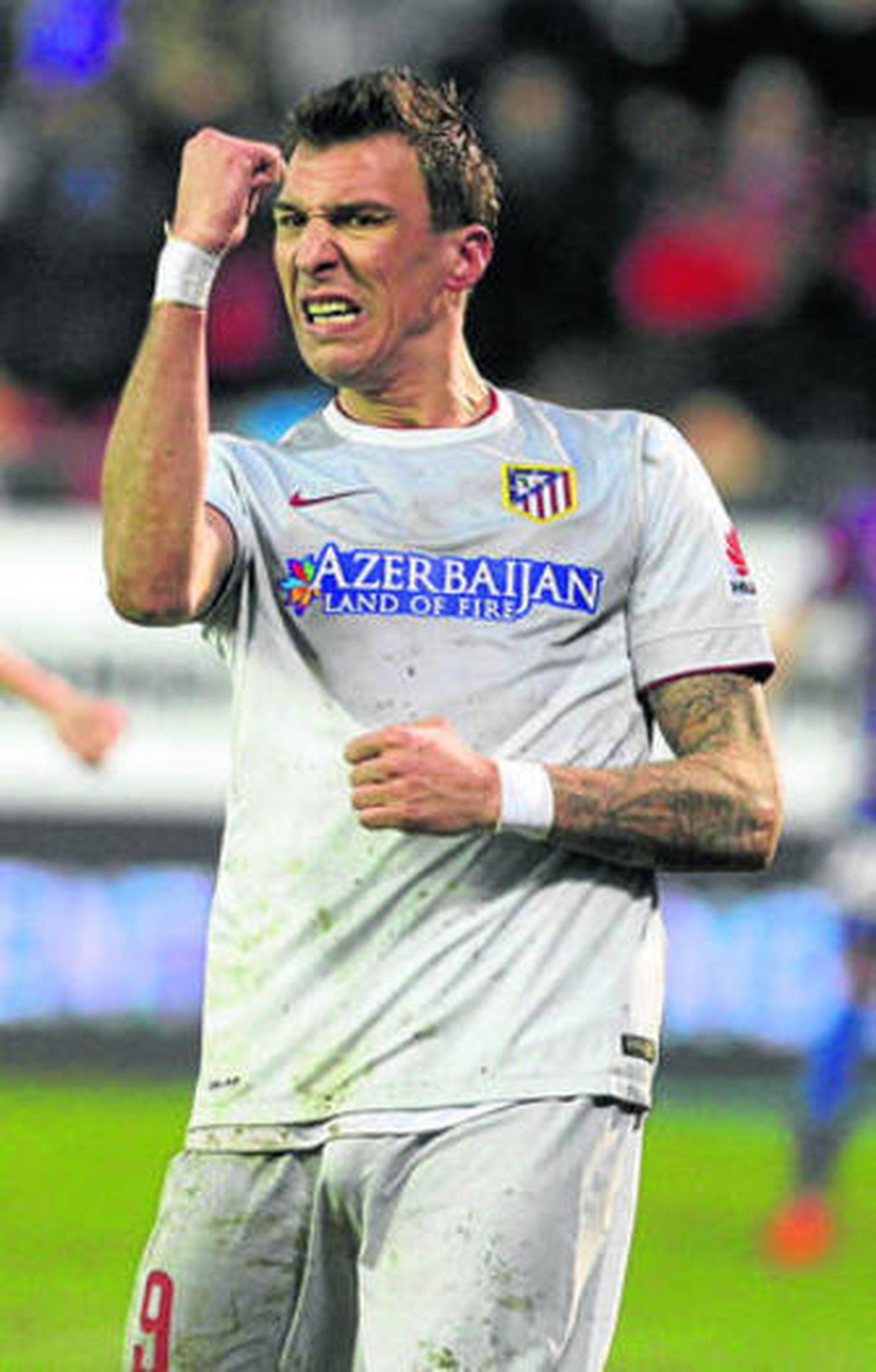 El atlético Mandzukic celebra uno de sus dos goles de ayer.