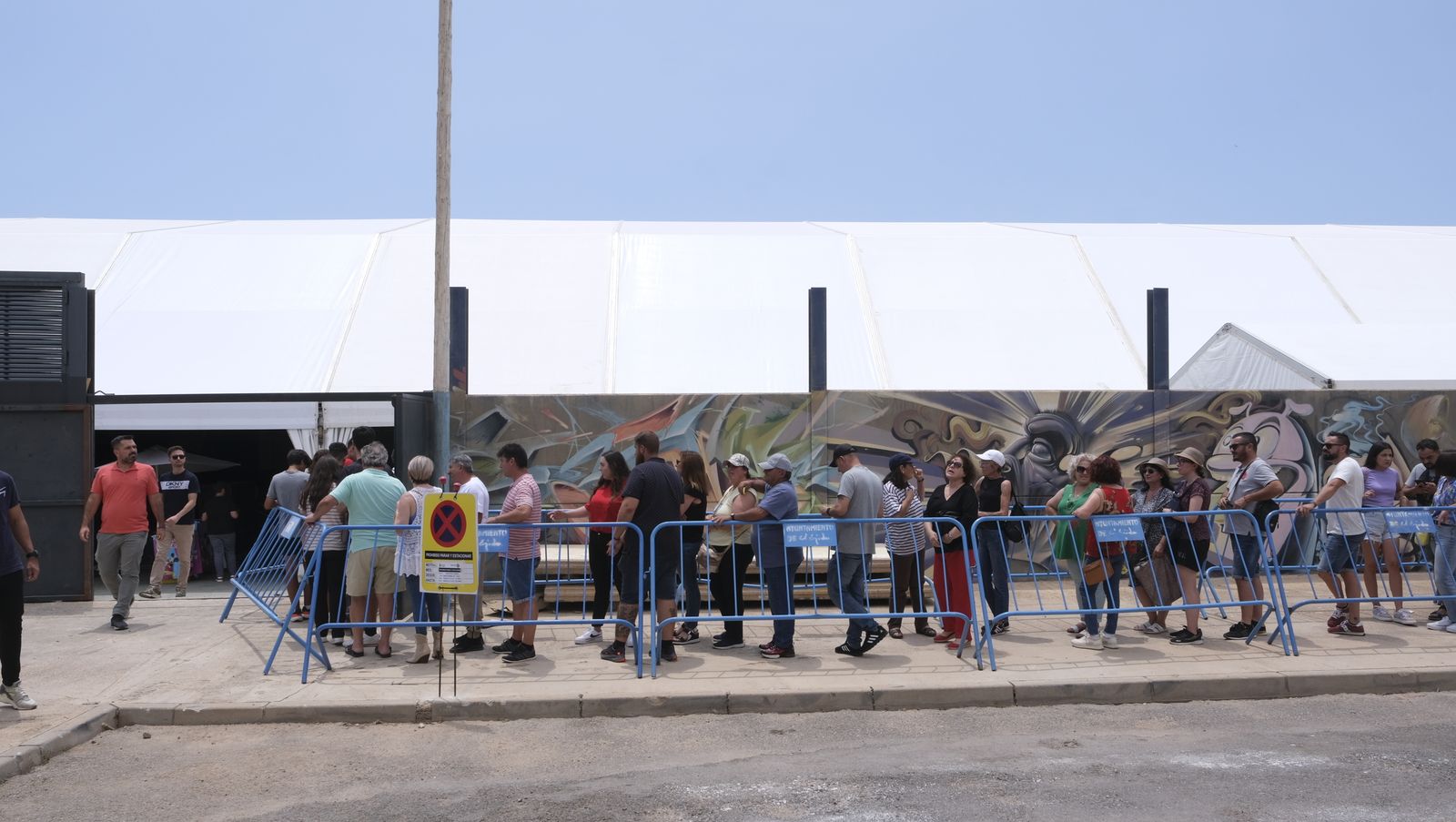 Imágenes de la degustación de huevos fritos con chorizo, en las Fiestas de Santa María del Águila