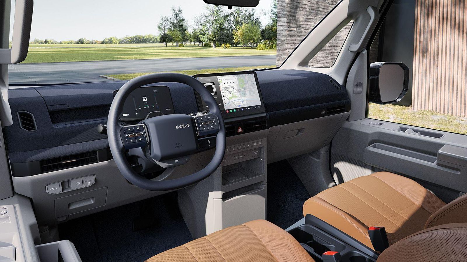 El salpicadero ofrece un diseño muy limpio, libre de elementos superfluos. Las dos pantallas, a diferencia de lo que ocurre con los turismos eléctricos, no están vinculadas entre sí bajo un mismo cristal.