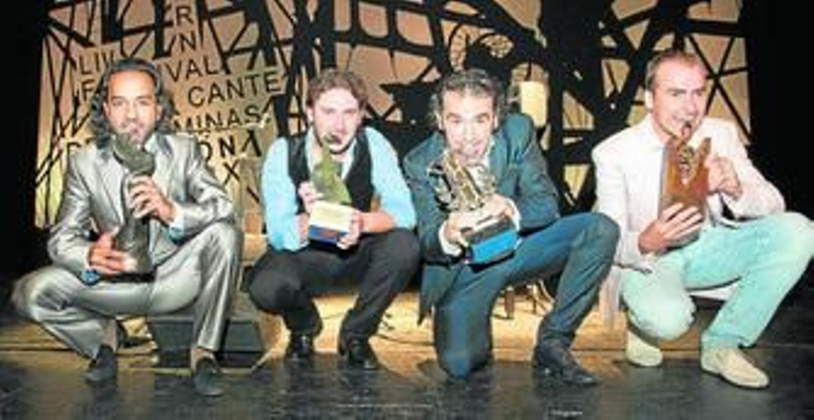 Juan Antonio Fernández Montoya 'Barullo', José Tomás Jiménez, David Lagos y Antonio Moreno, con sus trofeos.