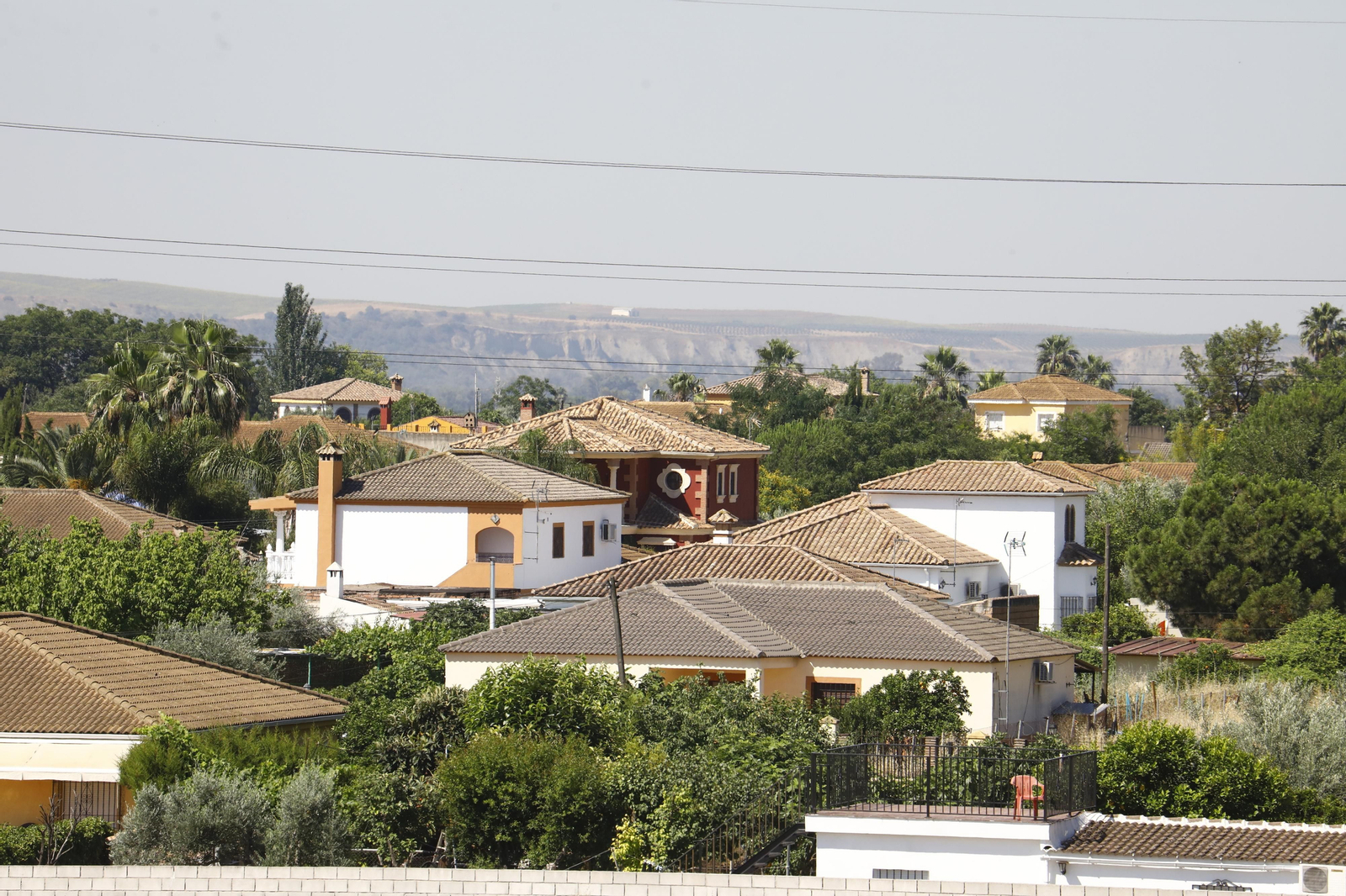 Un recorrido en fotografías por El Higuerón, uno de los barrios más pobres de Córdoba