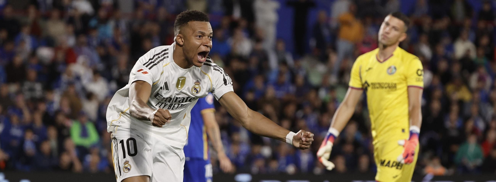 Mbappé celebra el gol que le dio el triunfo al Real Madrid ante la mirada de David Soria.
