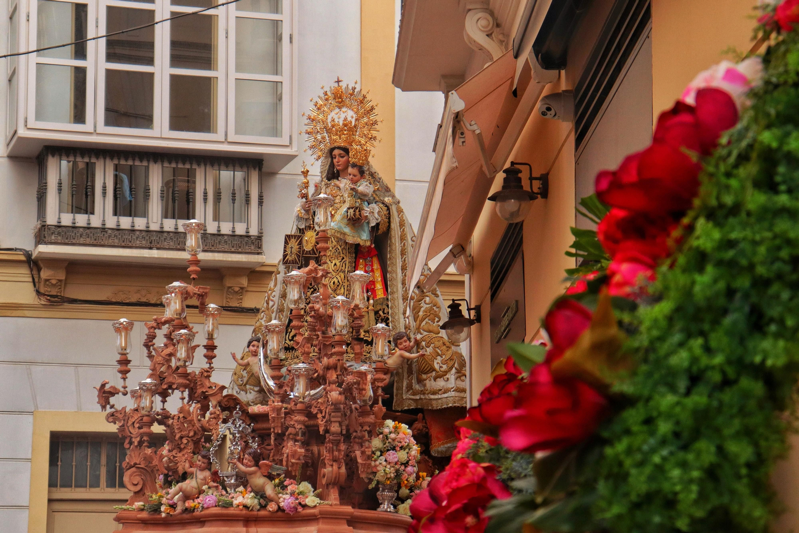 Embarque y procesión de la Virgen del Carmen del Perchel, en fotos