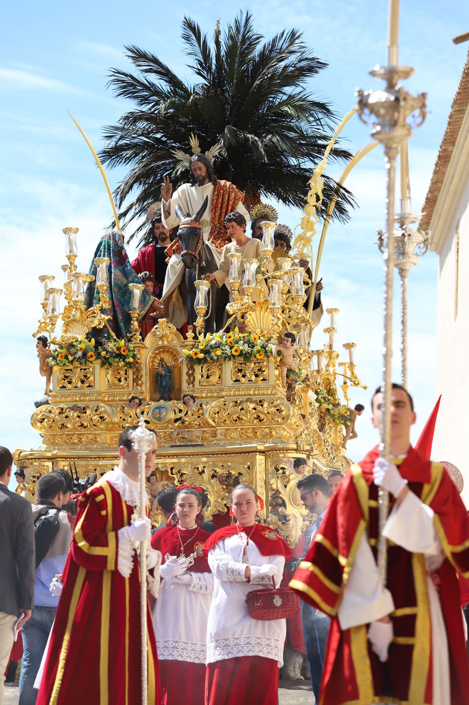 Las mejores imágenes de la hermandad de la Borriquita  de Huelva en el domingo de ramos 2019