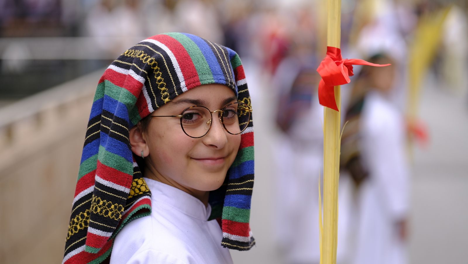 La Borriquita procesiona por las calles de Almería, en imágenes