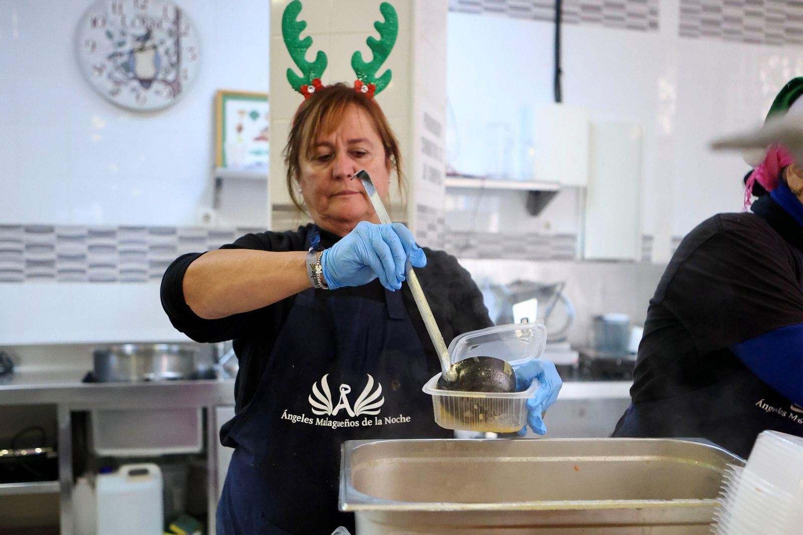 Las manos de la solidaridad en Málaga, en fotos