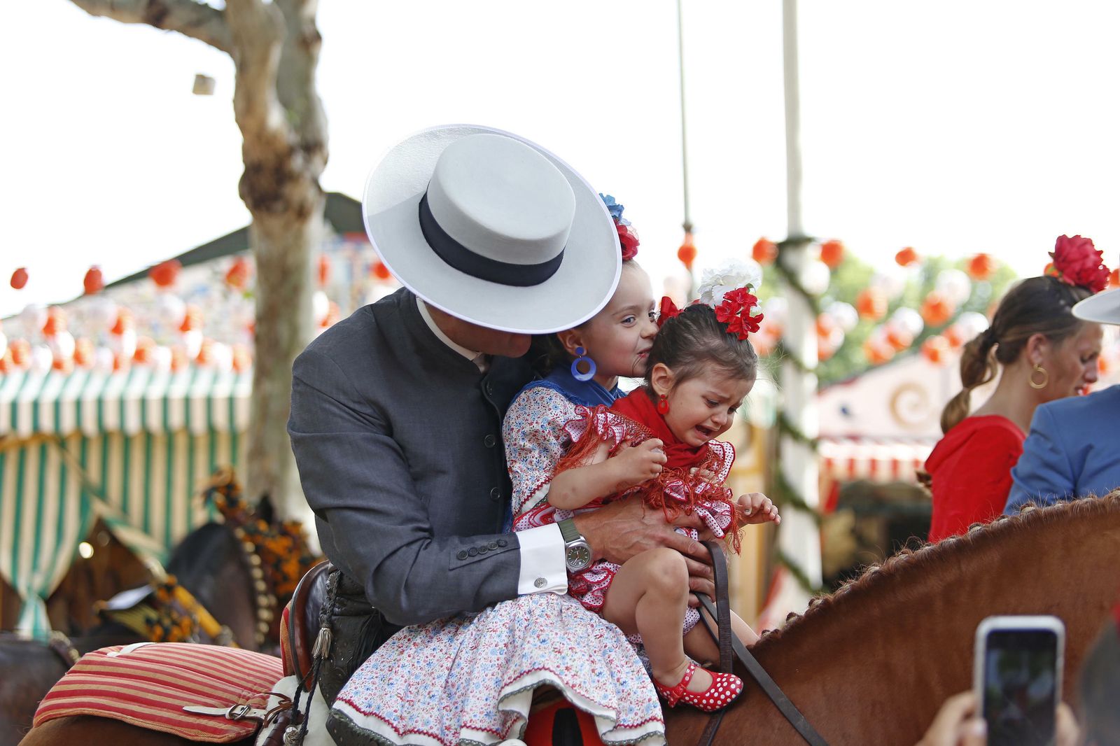 El Lunes de Feria, el primero con silencio en los 'cacharritos', en imágenes