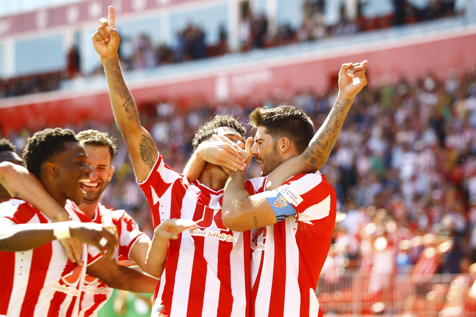 Imágenes del empate a 3 de la U.D. Almería y el Granada C.F.