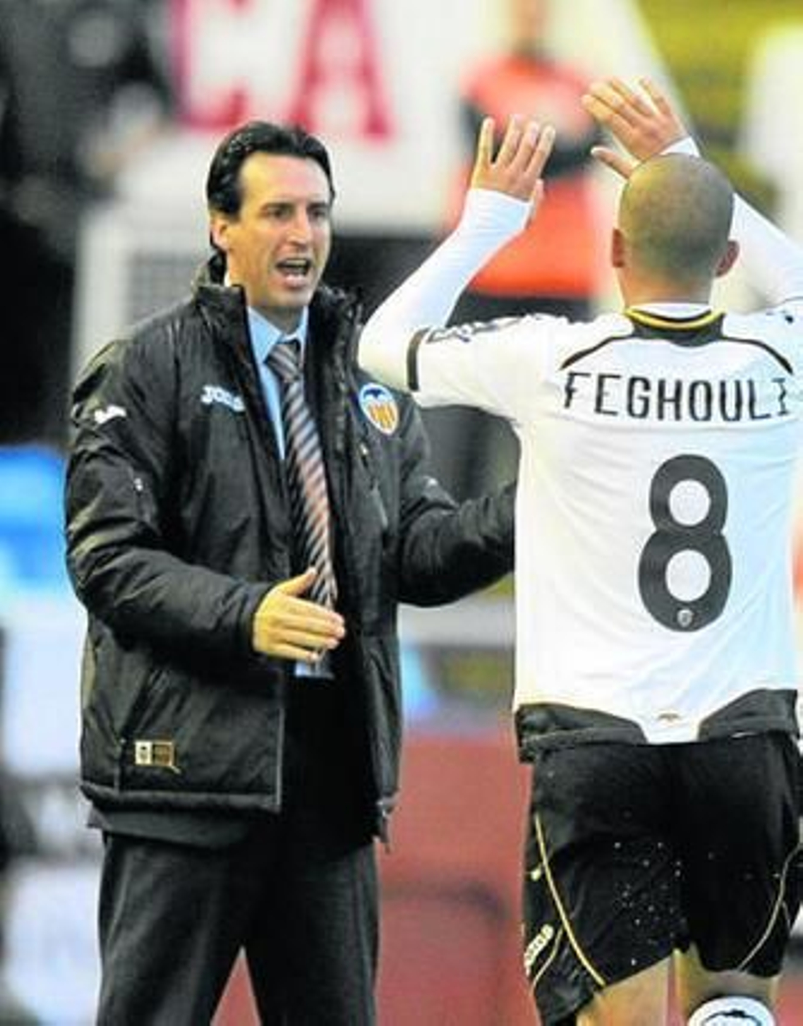 Feghouli celebra un gol con Emery en su etapa en el Valencia.