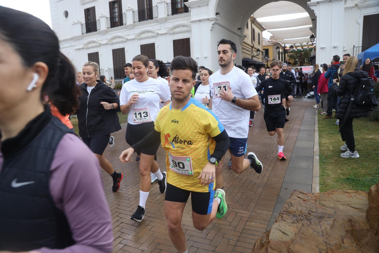 La Carrera por el Día Internacional de la Mujer en Málaga, en fotos