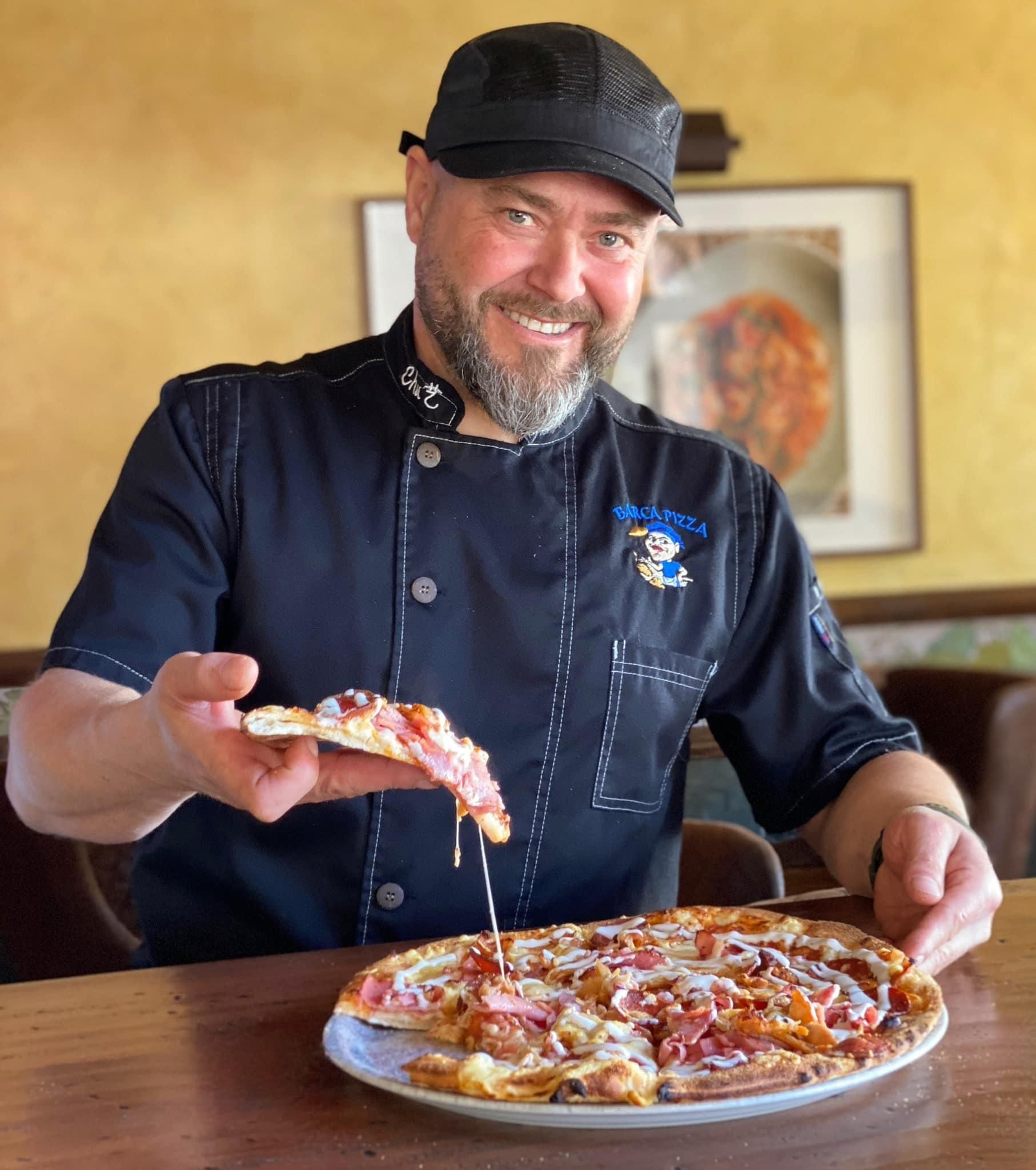 Porción de pizza, de Barca Pizza.