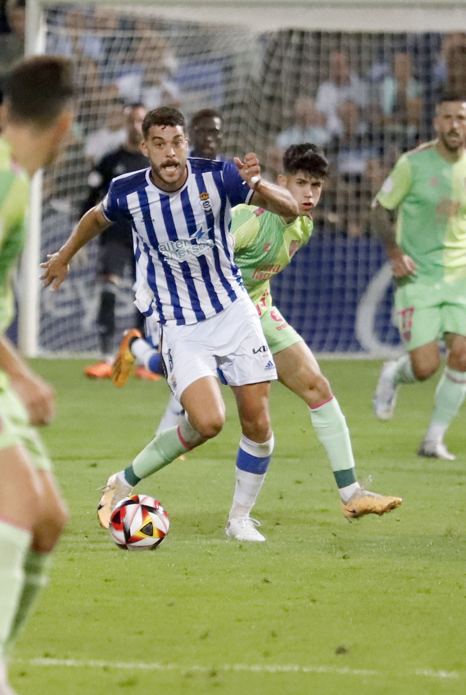 Imágenes del encuentro entre el Recreativo de Huelva y el Málaga