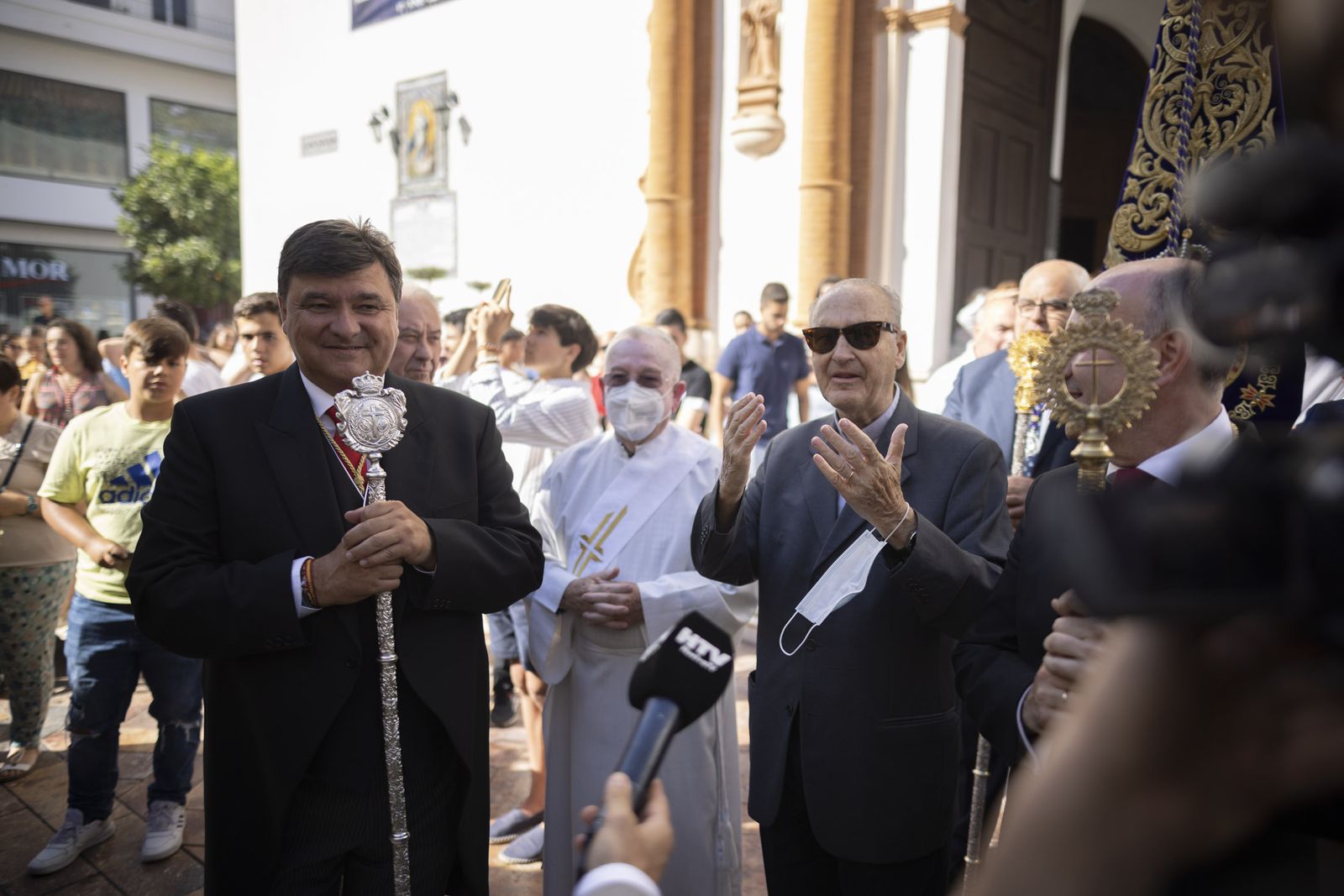 Imágenes de la salida extraordinaria de La Borriquita por las calles de Huelva