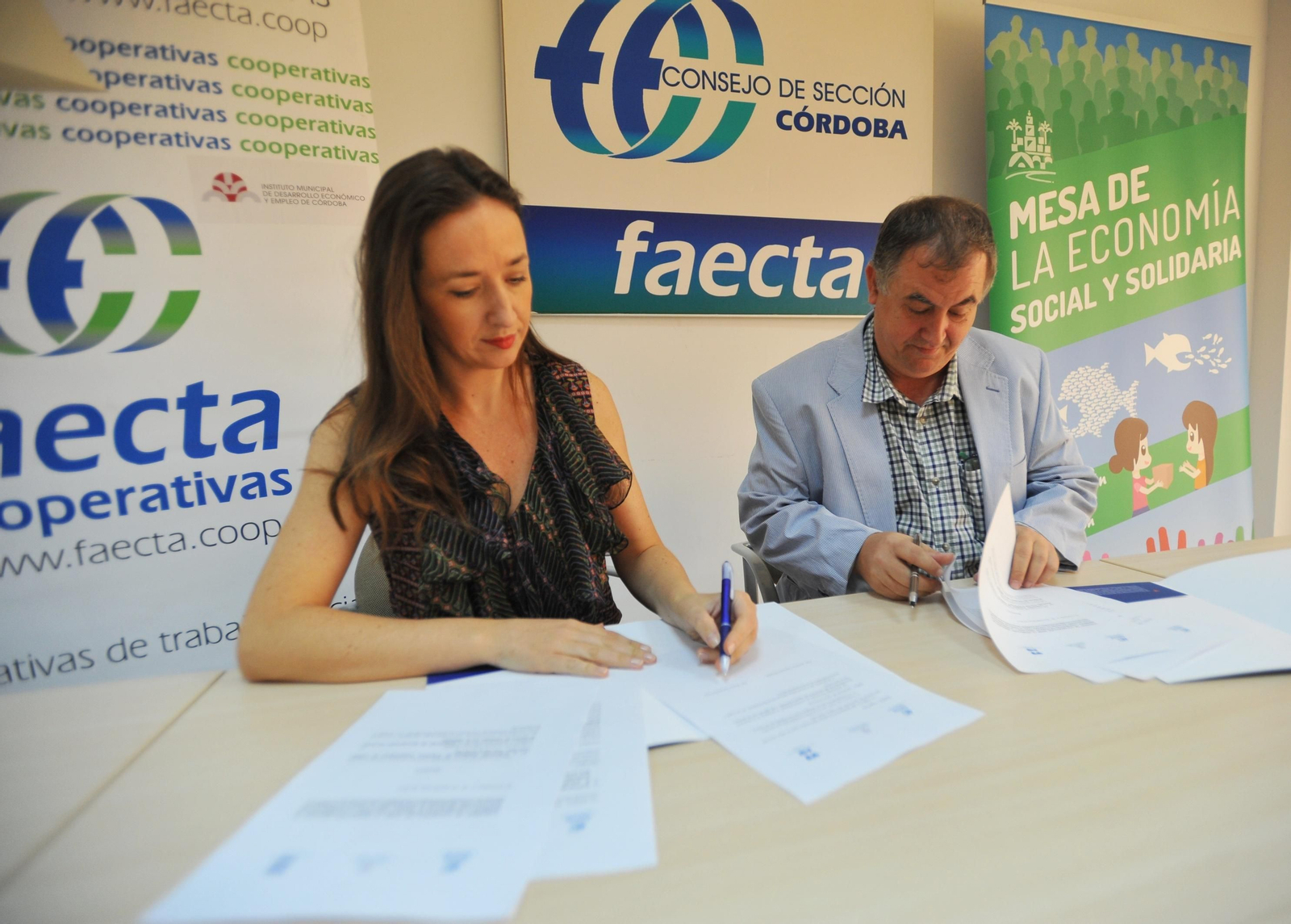 Firman del acuerdo entre las dos entidades.