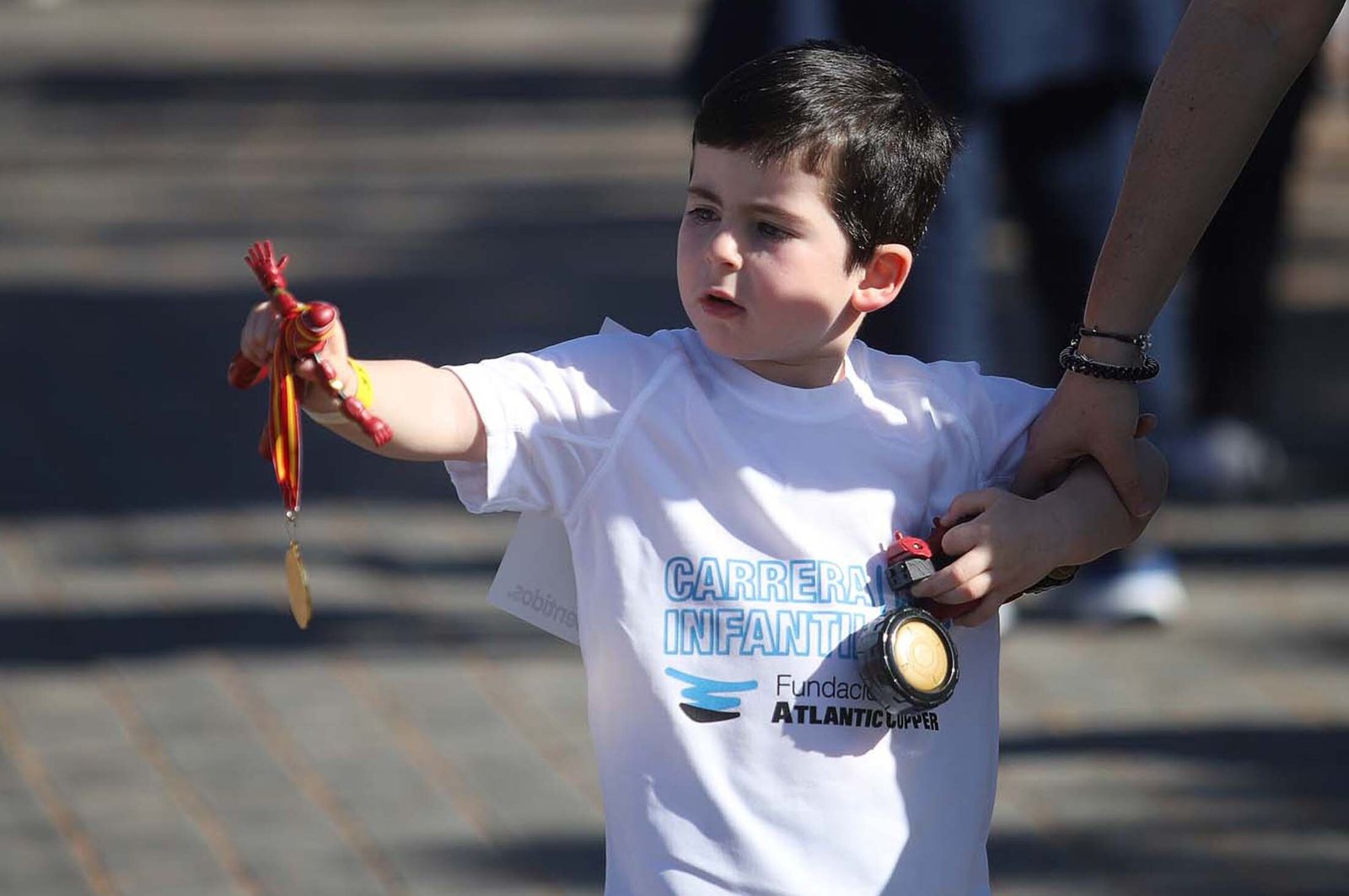Imágenes de la carrera infantil previa a la "10K Puerta del Descubrimiento"