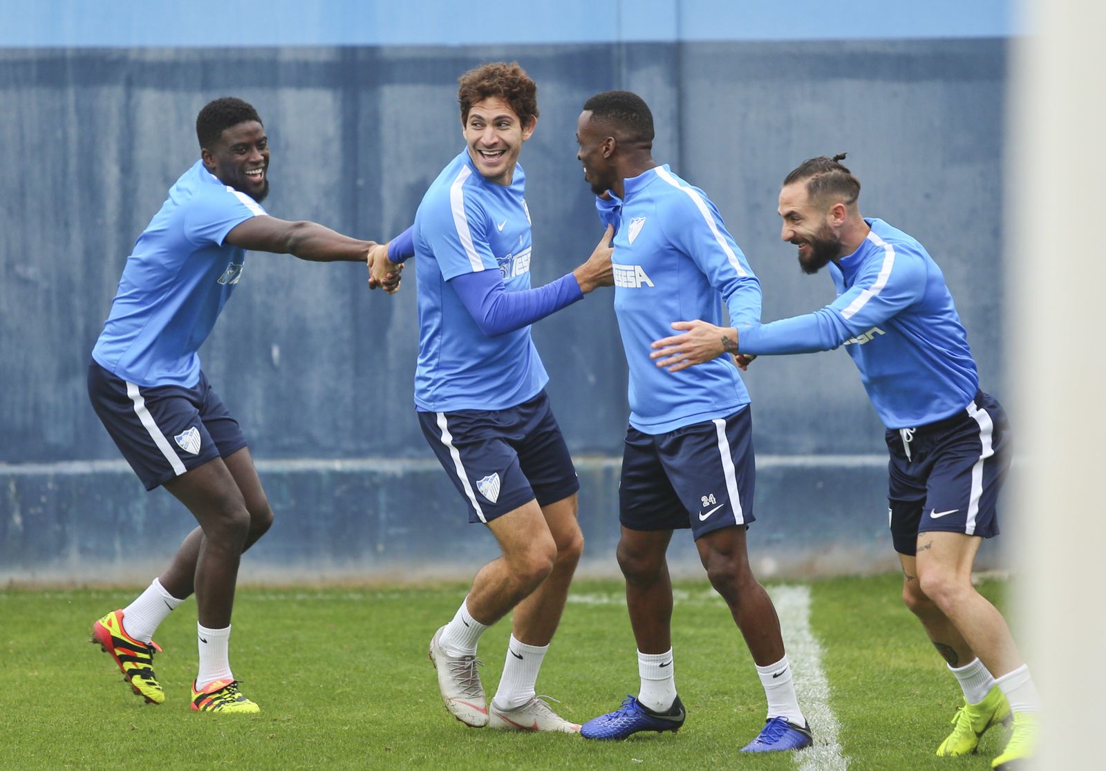 N'Diaye, Blanco Leschuk, Koné y Cifu, en el entrenamiento del Málaga CF.