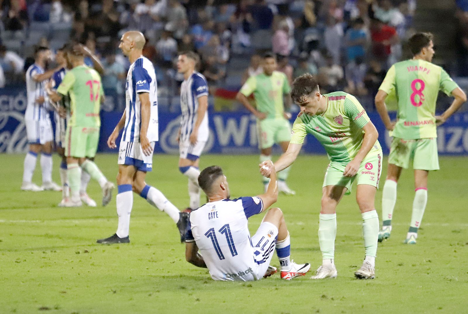 Imágenes del encuentro entre el Recreativo de Huelva y el Málaga