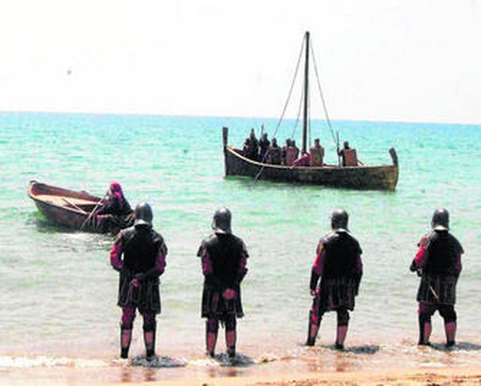 Escena en plena playa con San Juan en la barca.