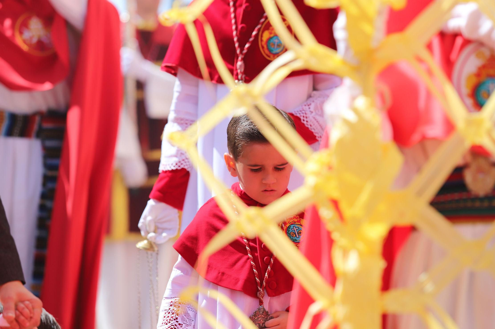 Imágenes del recorrido de la Borriquita  por las calles de Huelva