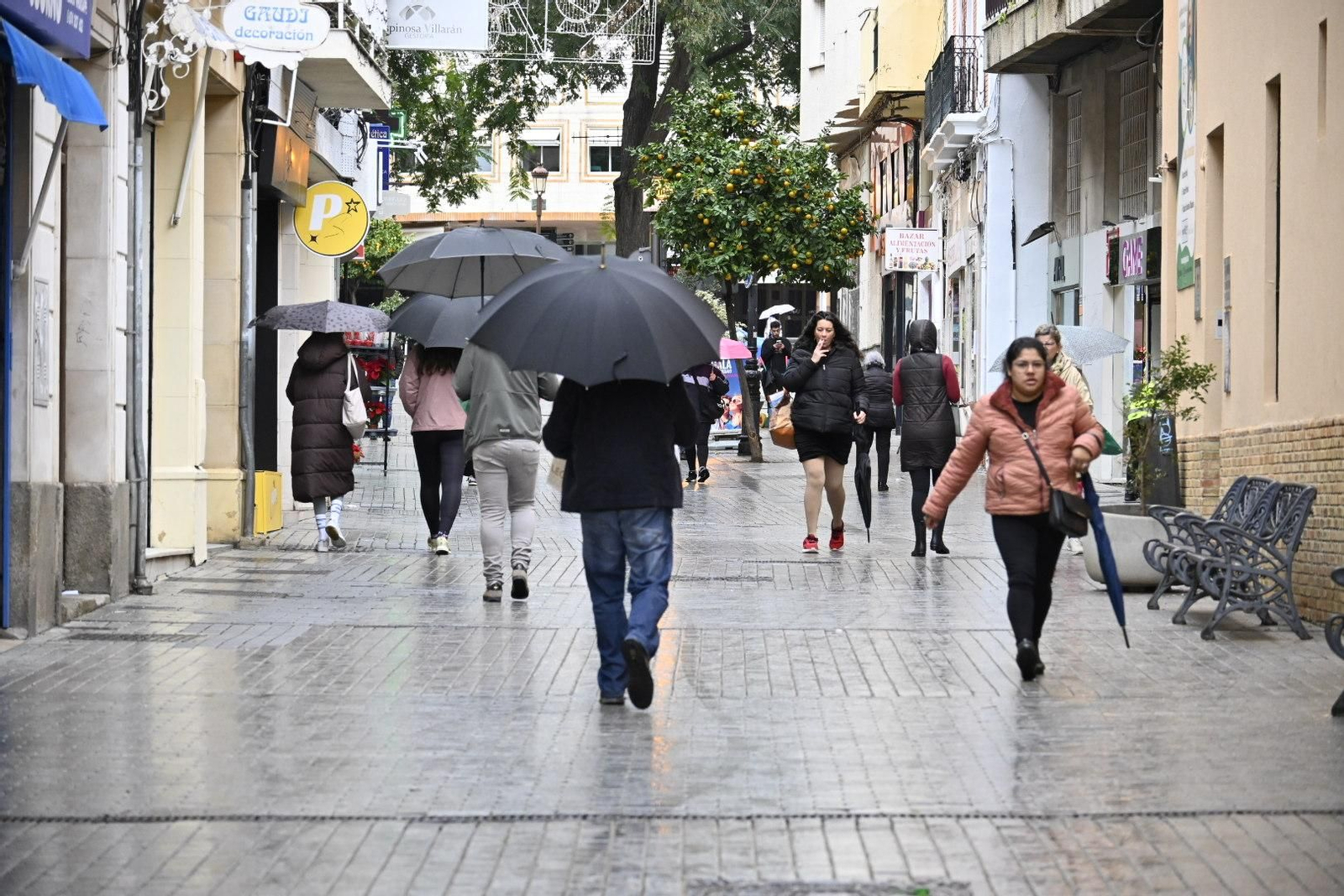 Imágenes de la lluvia de hoy en Huelva