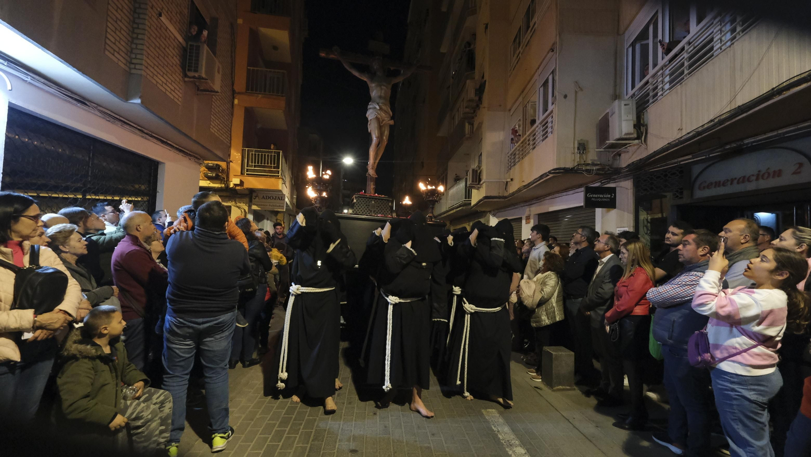 Procesión del Perdón en Almería, en imágenes