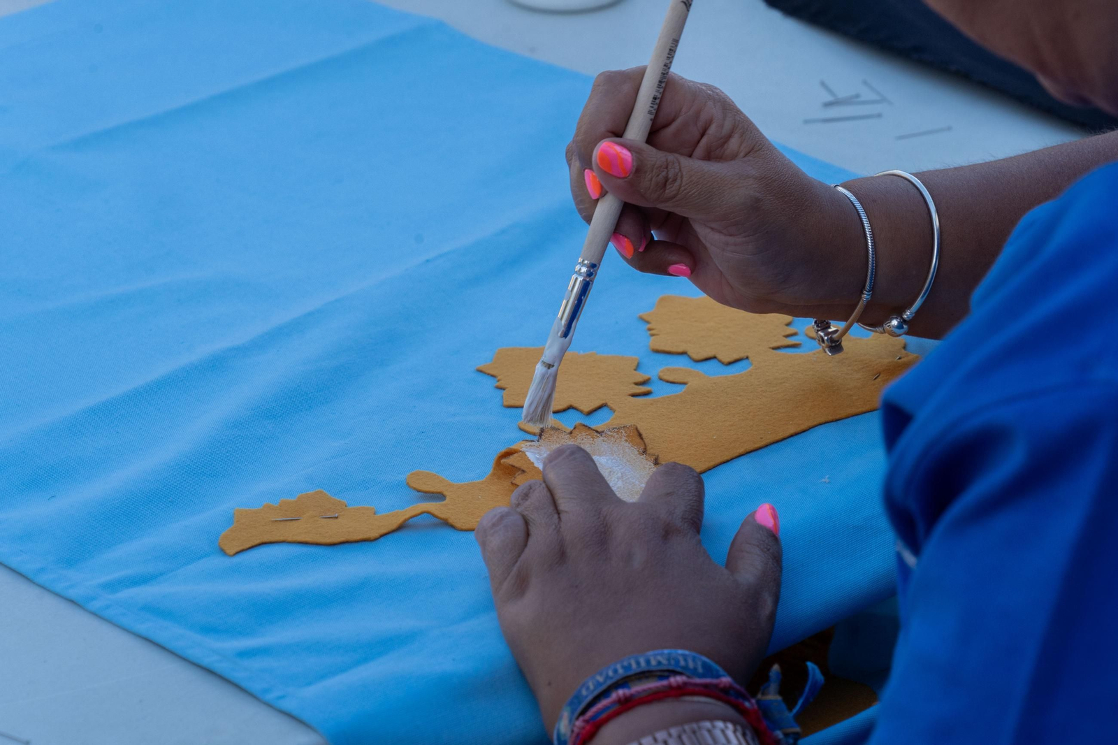 Imágenes de los talleres de la Hermandad de la Victoria de las decoraciones para La Magna Mariana