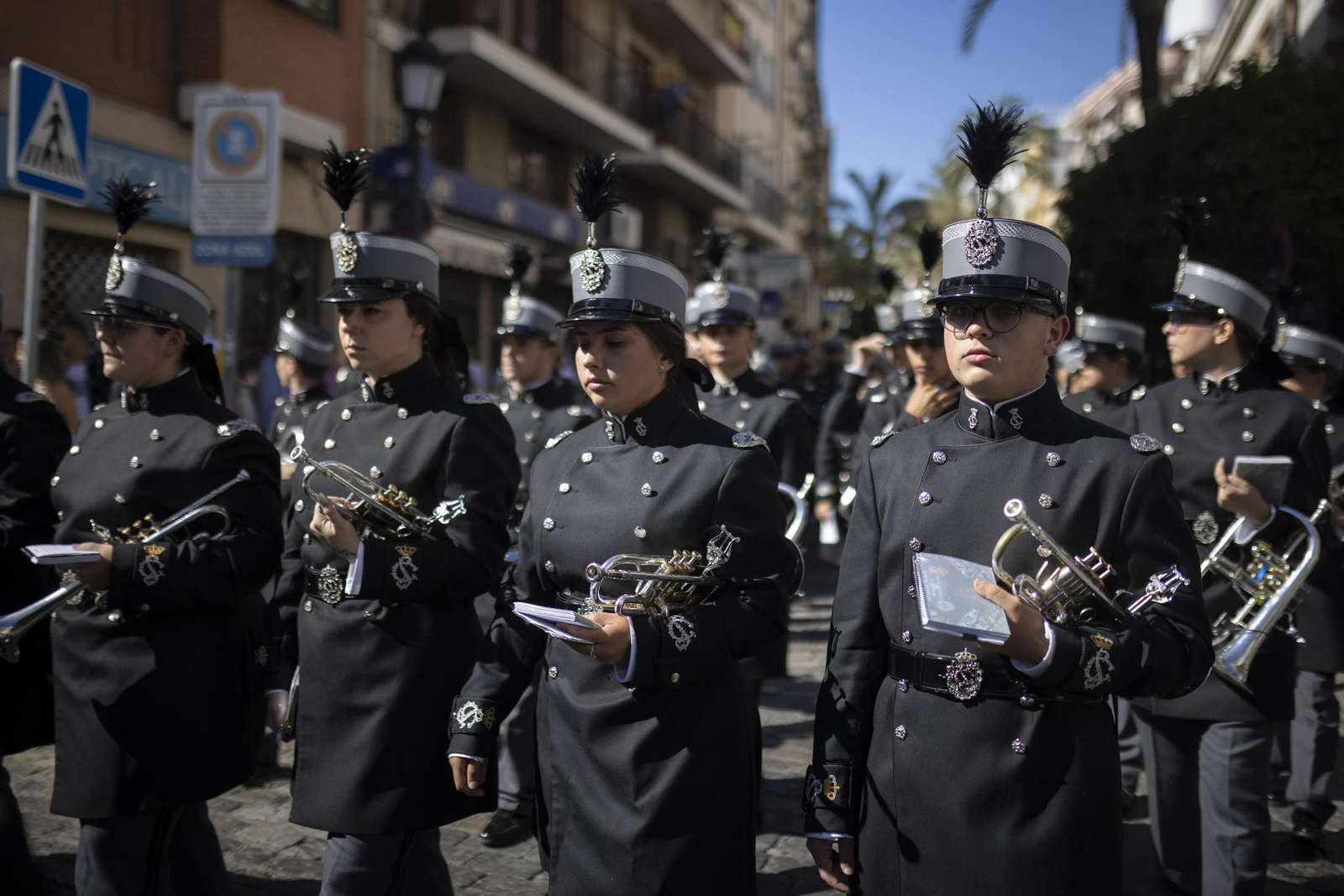 Imágenes de la salida extraordinaria de La Borriquita por las calles de Huelva