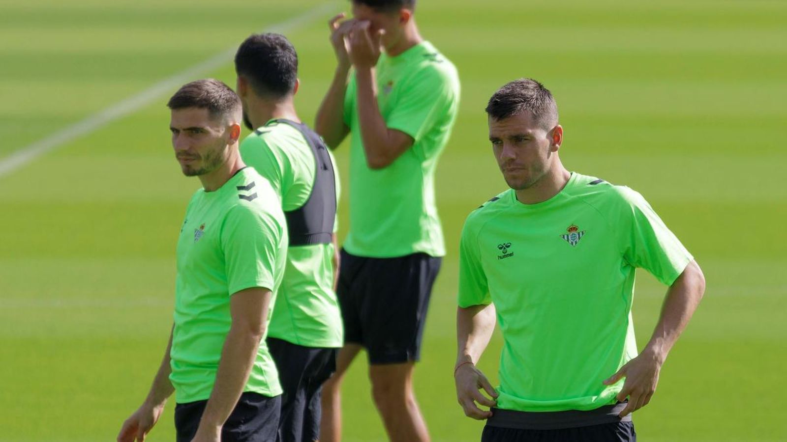 Lo Celso y Perraud, en un entrenamiento del Betis.