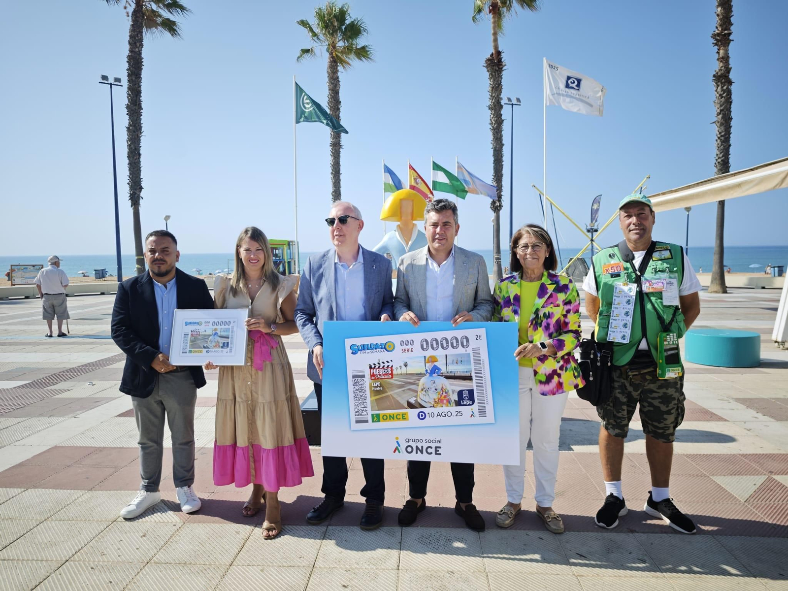 Presentación del cupón de la ONCE con la imagen del paseo marítimo de La Antilla.