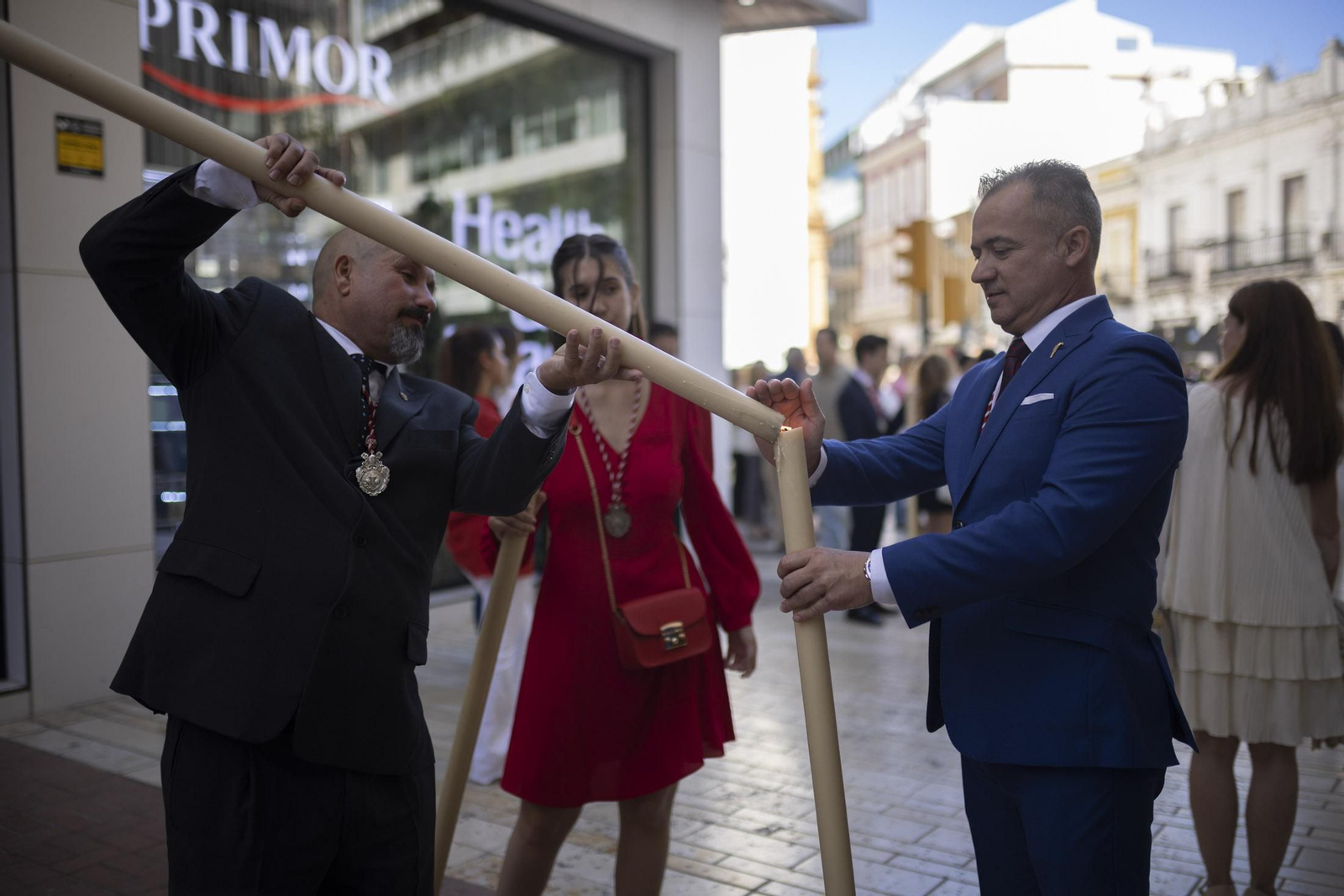 Imágenes de la salida extraordinaria de La Borriquita por las calles de Huelva