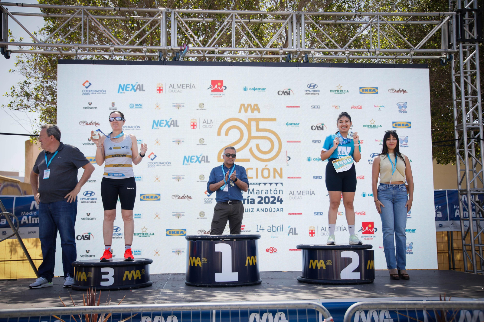 Imágenes de los premiados en la Media maratón de la Cuidad de Almería